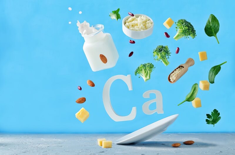nutry-alimentos-variados-ricos-em-cálcio-caem-sobre-prato-ca-cálcio